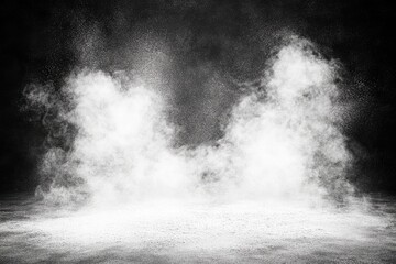 Dark background with white powder and smoke.  Two symmetrical plumes of white powder/smoke rising from a light-colored surface