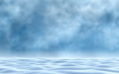 Gentle hills wave beneath a soft, blue cloudy sky in this scenic winter image