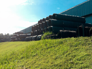 Stacked of high carbon wire rod for heavy industry production, Pile of metal steel wire roll for construction site