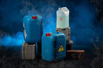 Toxic products packaged in jarrycan on a smoky blue and black background.