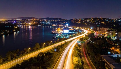 Fototapeta premium Urban nightscape riverfront city aerial photography bustling setting city lights modern life