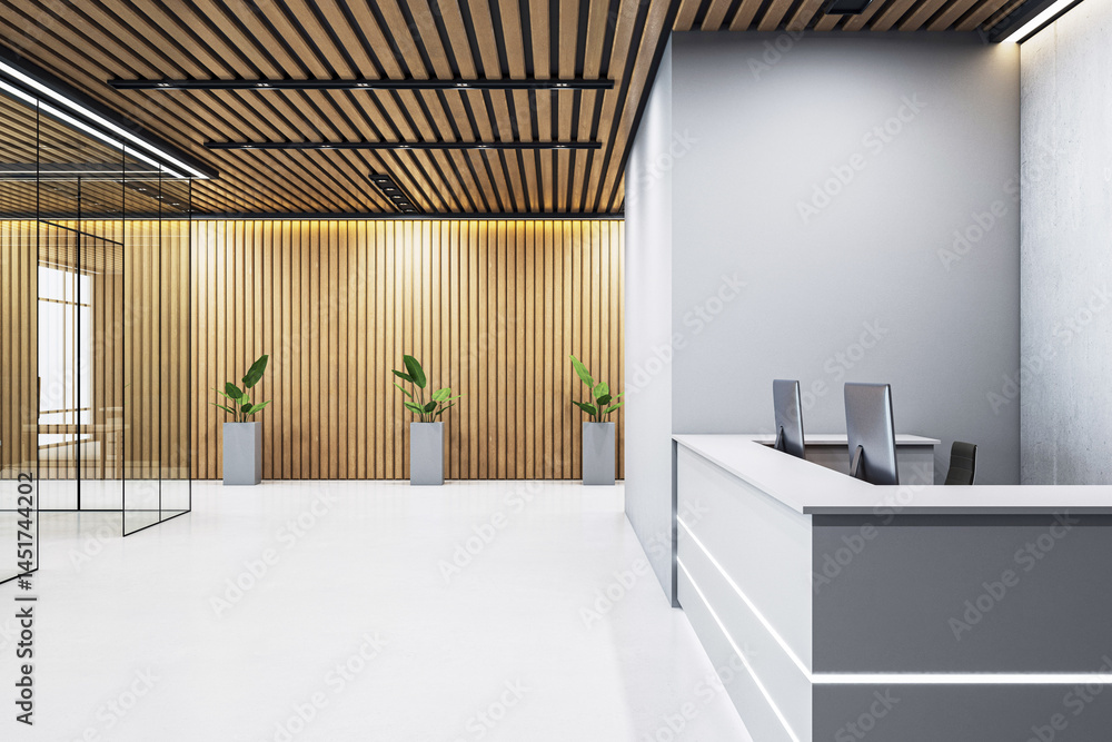 Poster modern empty office reception with wooden wall panels, glass partitions, and sleek desk with compute