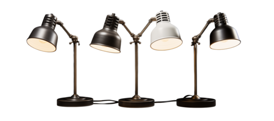 A row of four adjustable desk lamps with a mix of dark and white shades against a black backdrop transparent background png