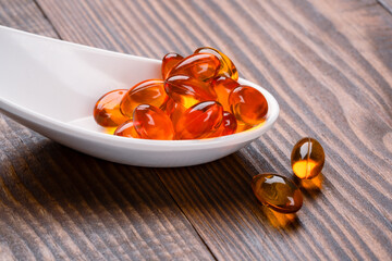 Dietary supplement containing omega 3 fish oil capsules