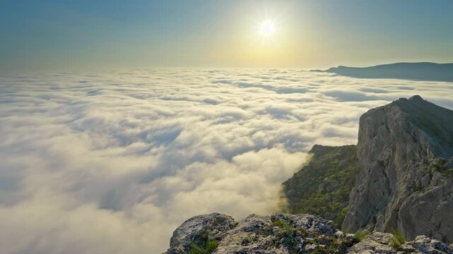 Mountain sunset over clouds. Misty nature landscape scene. Calm and zen nature scene. Color graded to Rec.709 from 10-bit Log source for maximum dynamic range. 