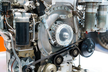 Detailed view of an automotive engine highlighting its complex components and mechanical design
