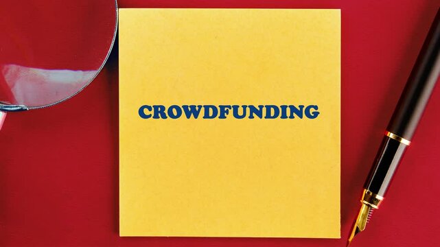 Animation of CROWDFUNDING text on a yellow sticker. Success Entrepreneurship Business Startup Technology Internet Network concept.