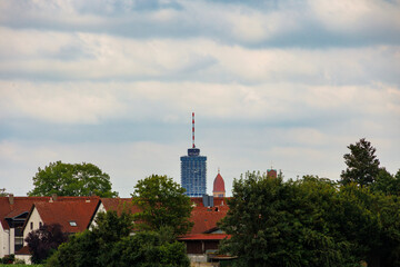 View over the fields near Augsburg towards the Pfersee district with the hotel tower and church...