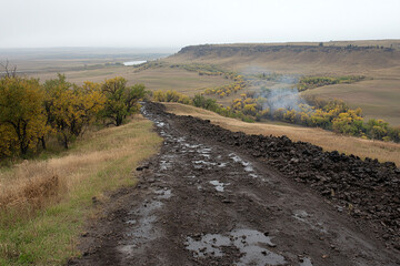 Fototapeta premium Pipeline construction underway for natural gas transport in rural terrain with hills