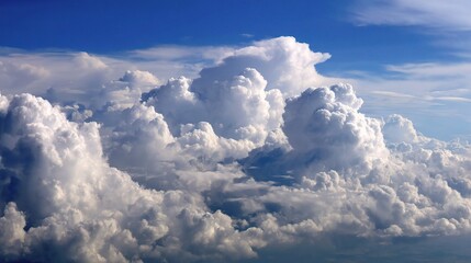 Bright Cumulus Clouds Stretching Across Endless Blue Sky