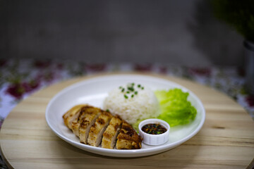 Grilled Chicken Breast With Rice On The Table