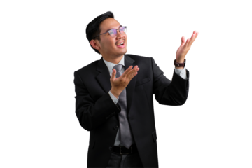 Confident young Asian businessman in black suit gesturing with hands while smiling isolated on transparent background