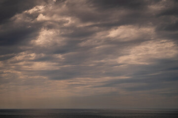 Ocean with sky in horizon. Calm sea in evening. Seascape at sunset.