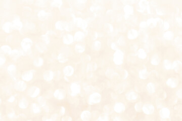 Golden yellow beige cream and white light glitter bokeh texture background. New Year, Christmas and all celebration background concepts.