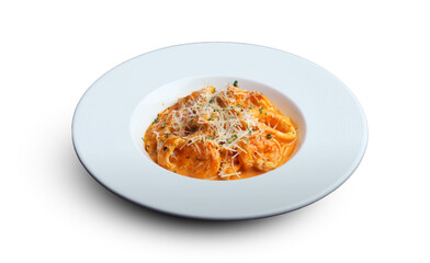 Seafood pasta Frutti di Mare in tomato cream sauce, topped with parmesan and herbs, served on a white plate.