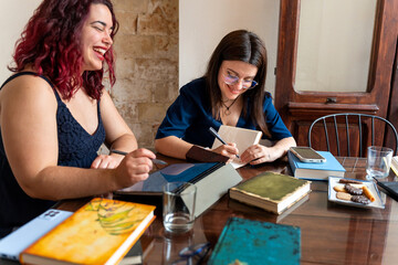 Writers working together on new book manuscript at home