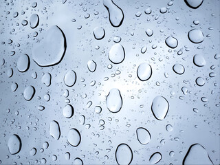 Water Drops on Glass Window.