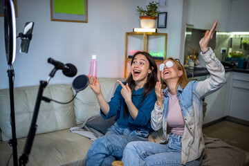 Influencers promoting beauty products in a video for social media.