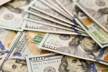 Background with money American hundred dollar bills. 100 dollar bills background close up