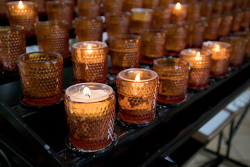 Religious and Christian objects and candles on the Munich Way of St. James, Bavaria, Germany