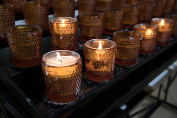 Religious and Christian objects and candles on the Munich Way of St. James, Bavaria, Germany
