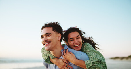 Piggy back, laugh and couple at beach for romantic vacation, holiday and weekend outdoors. Travel,...