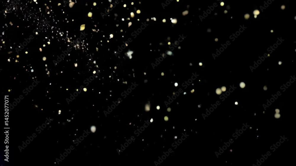 Aufkleber this mesmerizing image captures golden particles gracefully floating through darkness, creating a sh