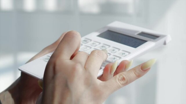 Financial planning.
An office worker develops a financial strategy.
Financial literacy.
A financier calculates profit and calculates a budget on a calculator.
Finance and economics