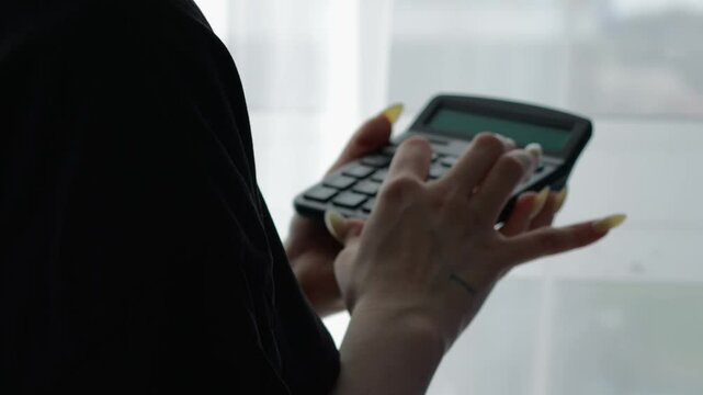 Financial planning.
An office worker develops a financial strategy.
Financial literacy.
A financier calculates profit and calculates a budget on a calculator.
Finance and economics