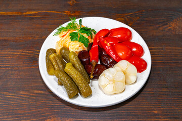 Colorful assortment of pickled vegetables on a plate