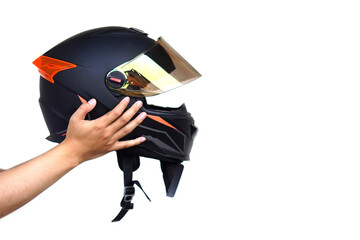 Close up hands hold helmet, isolated on white background. Concept: safety in transportation. Helmet helps prevent head injuries in accidents. Campaign to wear helmet when riding a motorcycle. 