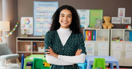 Woman, teacher and portrait in classroom with confidence, smile and montessori about us. Educator,...