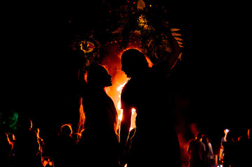 People dance in the firelight on Ivan Kupala