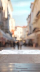 Fototapeta premium a white bench on a city street with buildings in the background 