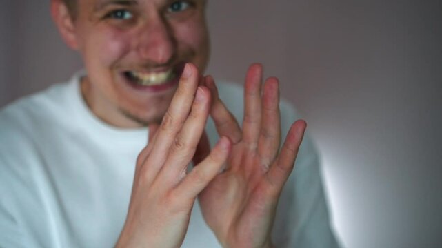 A man with a sly expression on his face in front of the camera.
An evil and cunning guy.
A cunning man came up with a plan.
A cunning plan and a cunning look