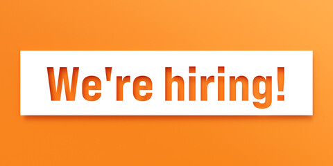 We are hiring! Die-cut letters on orange background. Marketing, recruitment, job interview, occupation, vacancy, trainee, job fair.