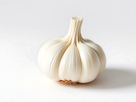 single clove of garlic on white background