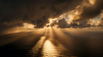Golden ethereal rays pierce through turbulent clouds over vast ocean surface with stunning beauty