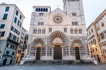 Facade of the Cathedral of San Lorenzo (Cattedrale di San Lorenzo) in Genoa, featuring alternating...