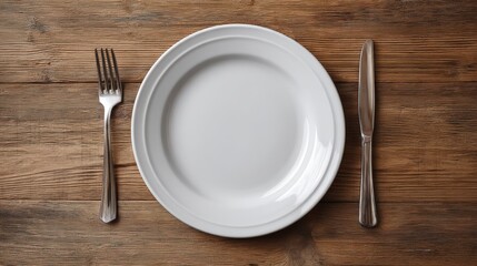 Empty White Plate and Cutlery on Rustic Wooden Table Setting