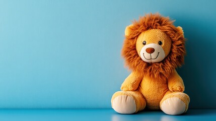 Plush lion toy sits on blue background; playful image for children's products