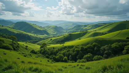 Obraz premium Lush green hills and valleys under cloudy sky create serene landscape