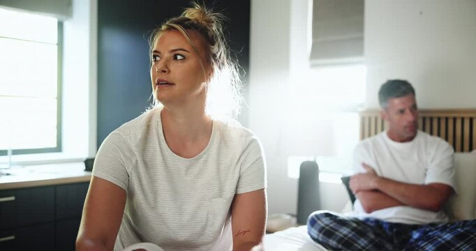 Bedroom, couple and woman with ignore after fight, misunderstanding and sad in toxic marriage. Home, man and angry partner with silent treatment in relationship, cheating and divorce for infidelity