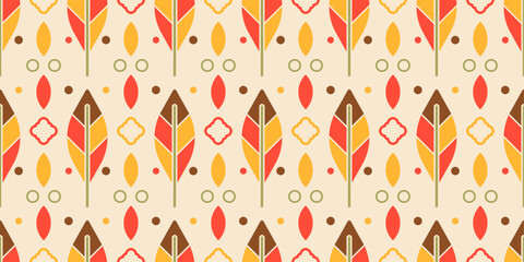 Leaves are composed of triangular sections in shades of brown, yellow, and red, with a green stem. Interspersed among the leaves are small circles, oval shapes, and four-pointed flower-like figures.
