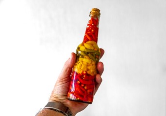 Traditional Brazilian hot pepper sauce from a bar, mix of hot peppers