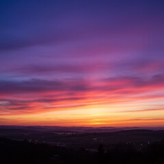 Fototapeta premium Vibrant Sunset Landscape with Pink and Orange Hues