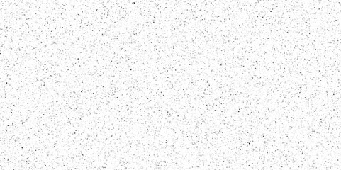 Terrazzo background with scattered gray and black dots. Rock spatter stone marble backdrop. White wall texture with noise overlay pattern. Vintage quartz terrazzo flooring.