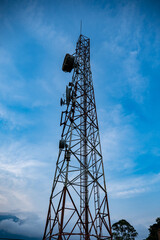 telephone repeater antennas with cloudy skies