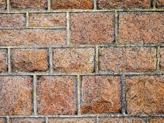 Red brown stone wall texture background for design.