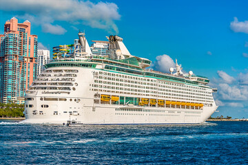 A close up view of a cruise ship passing South Pointe Park in Miami in springtime